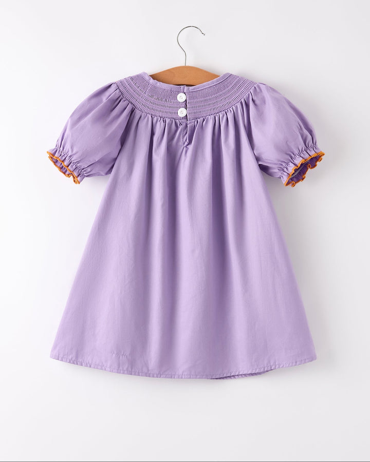 Lavender smock dress with buttoned neckline and gathered skirt