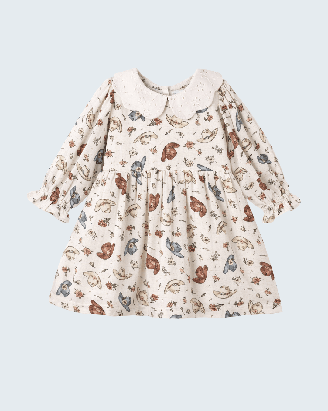 Printed linen girls’ dress with long sleeves, gathered waist, and white eyelet collar