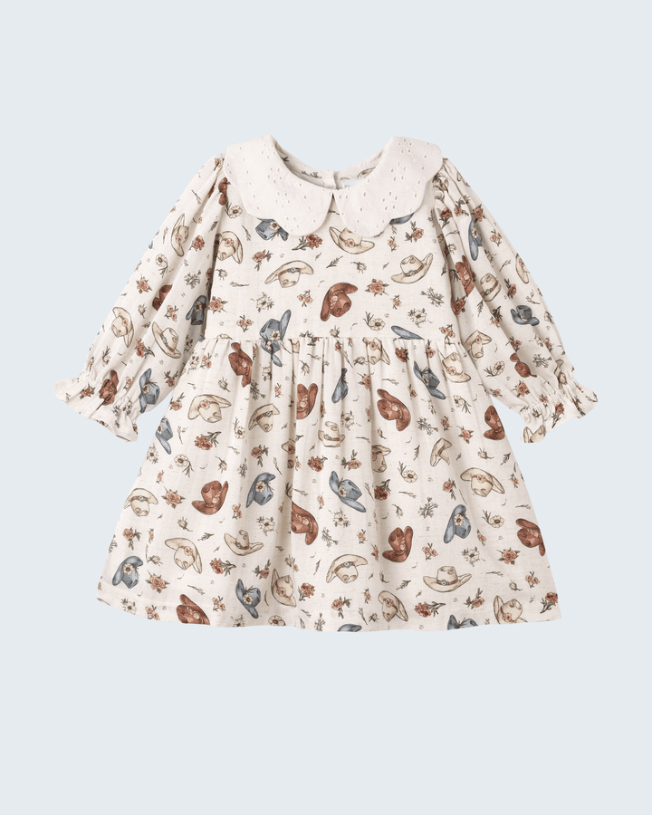 Printed linen girls’ dress with long sleeves, gathered waist, and white eyelet collar