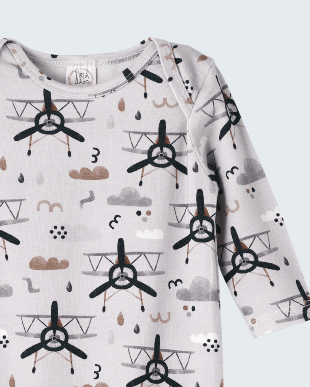 Baby bodysuit with crew neckline, light gray, black airplane and cloud prints
