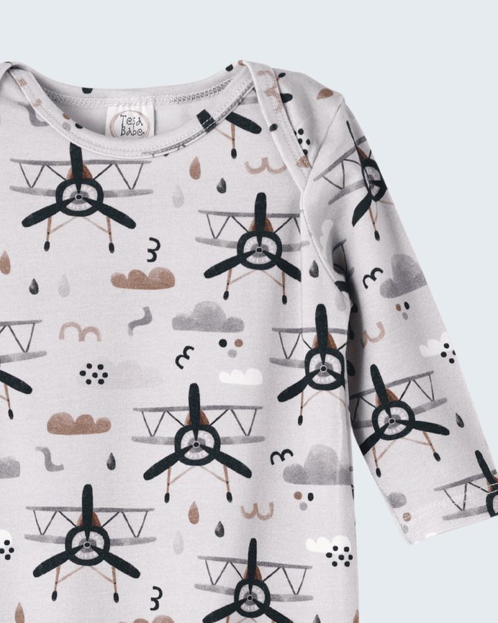 Baby bodysuit with crew neckline, light gray, black airplane and cloud prints