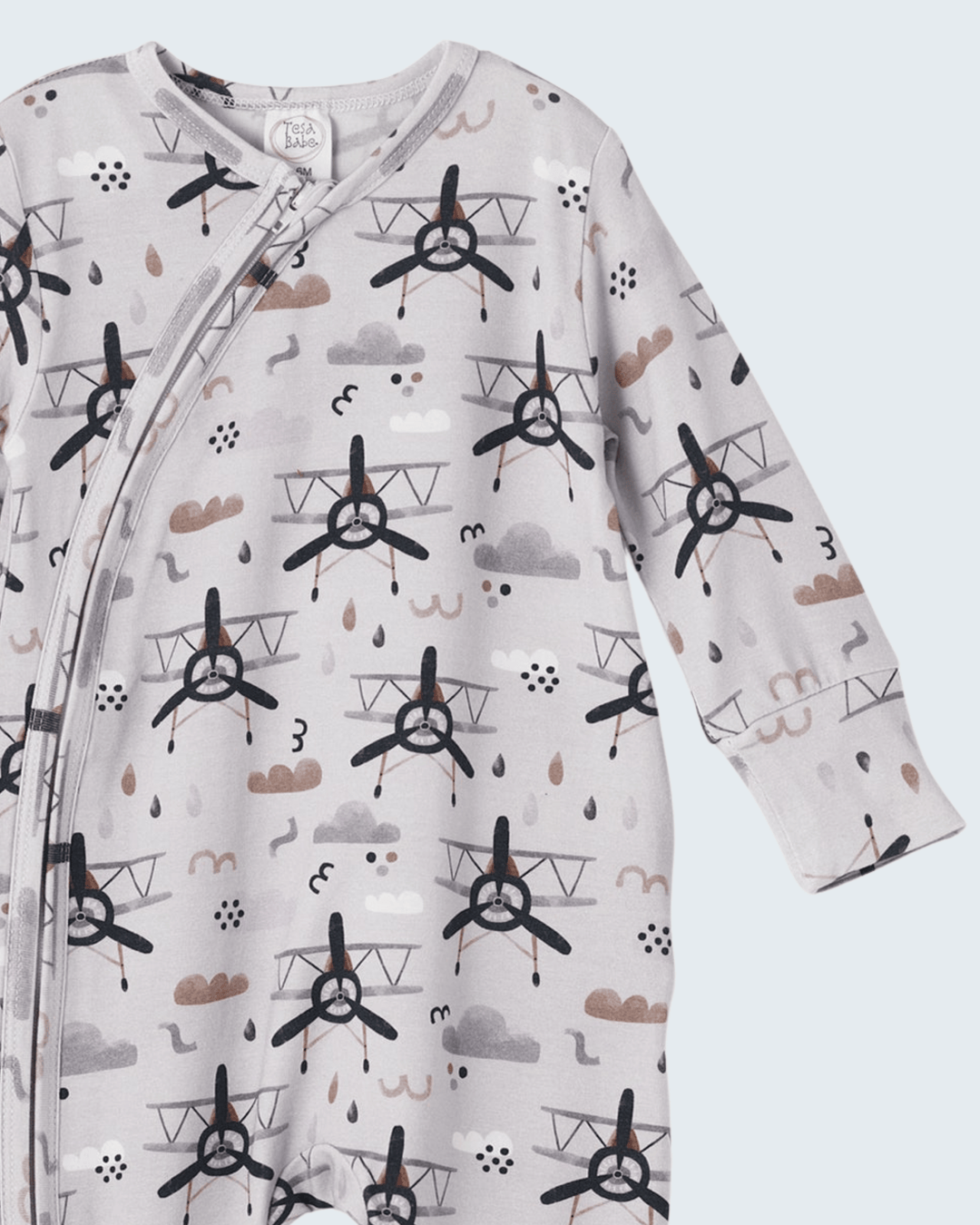 Bamboo zipper romper with long sleeves, front zipper, pale allover graphic, crew neck.