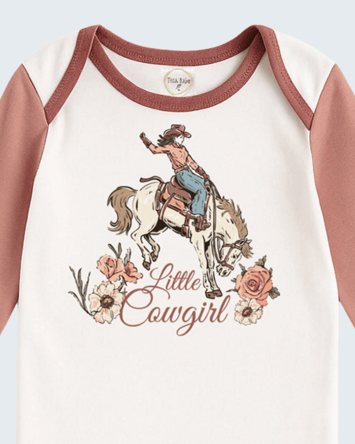 Baby cotton rib bodysuit with cowgirl and horse print, cream body and dusty rose sleeves
