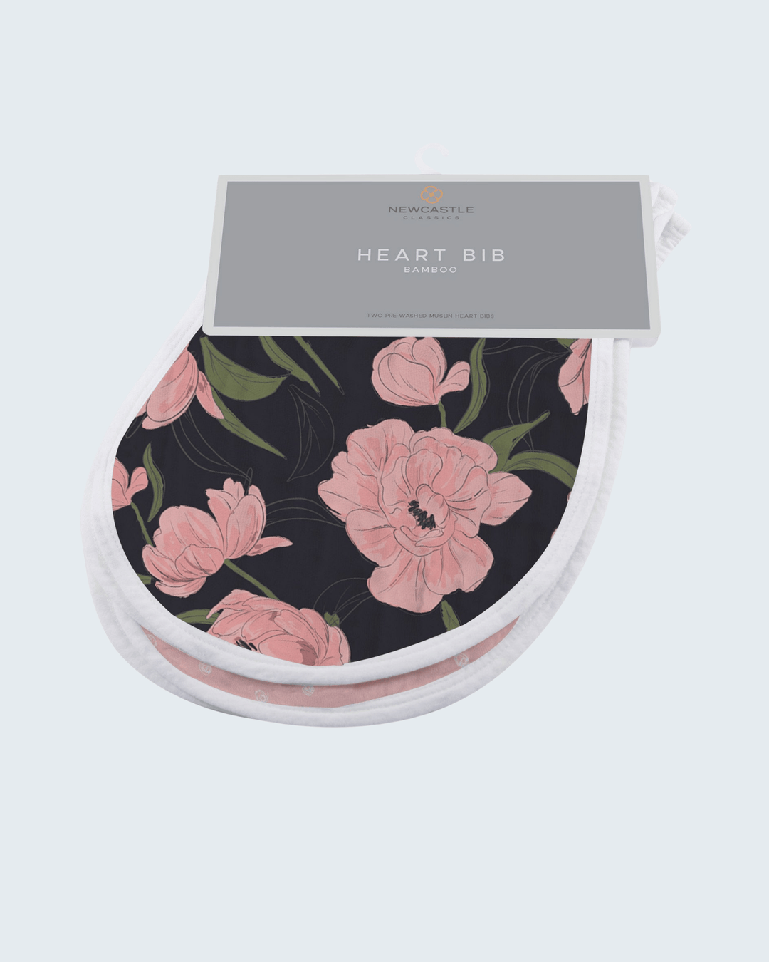 Floral-patterned bib with packaging on a white background