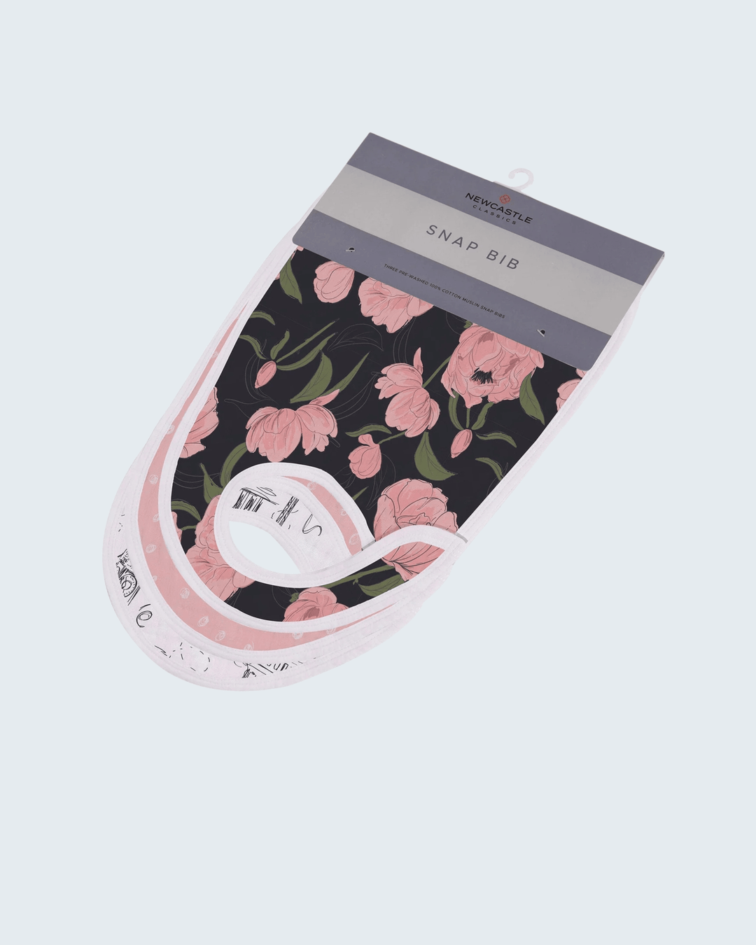 Floral-patterned bib with a packaging tag on a white background