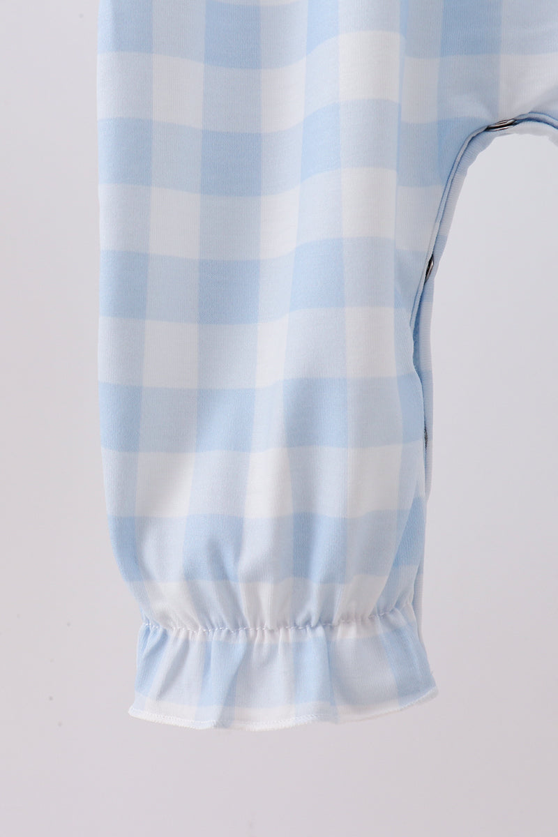 Light blue gingham romper with elastic leg cuffs and gathered sleeve hem