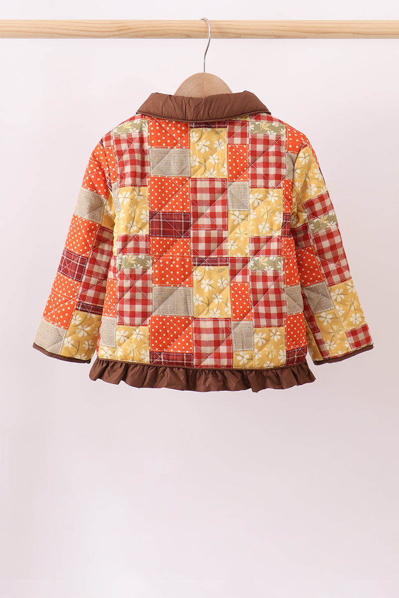 Hooded patchwork ruffle jacket with plaid and floral panels, brown buttons and trim