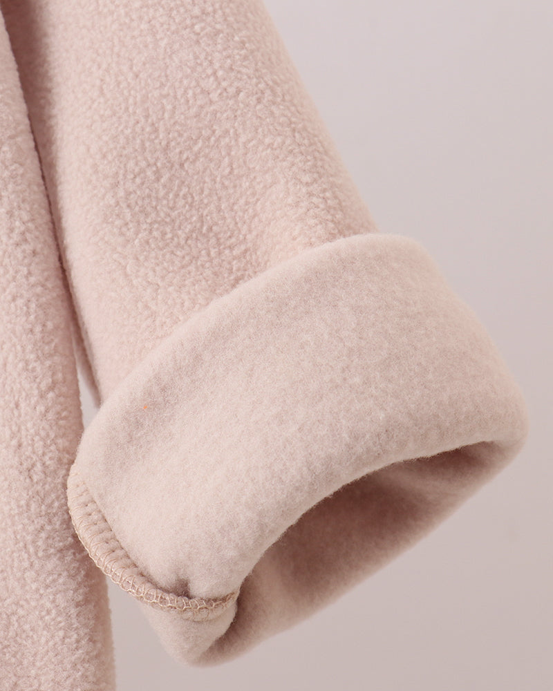 Beige fleece hooded coat sleeve cuff with stitched hem detail
