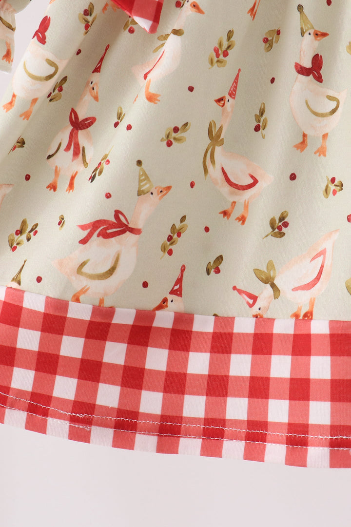 Cream dress skirt with red gingham ruffle hem and embroidered animal print panel