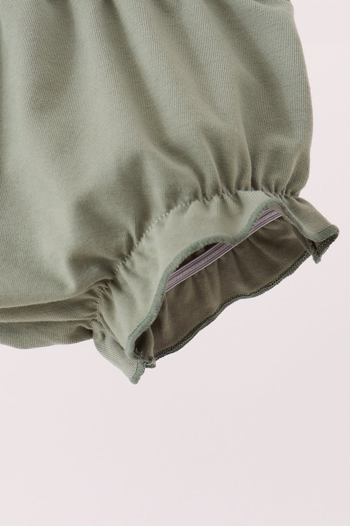 Green baby bloomer shorts hem with gathered cuff detail