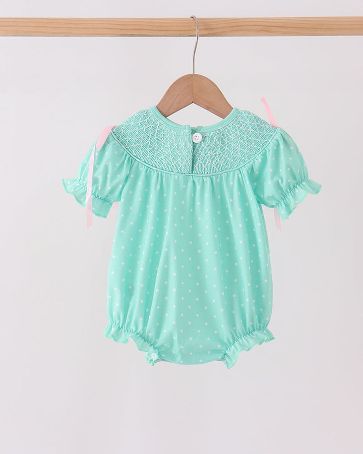 Mint green baby bubble back with white polka dots, ruffled collar, flutter sleeves