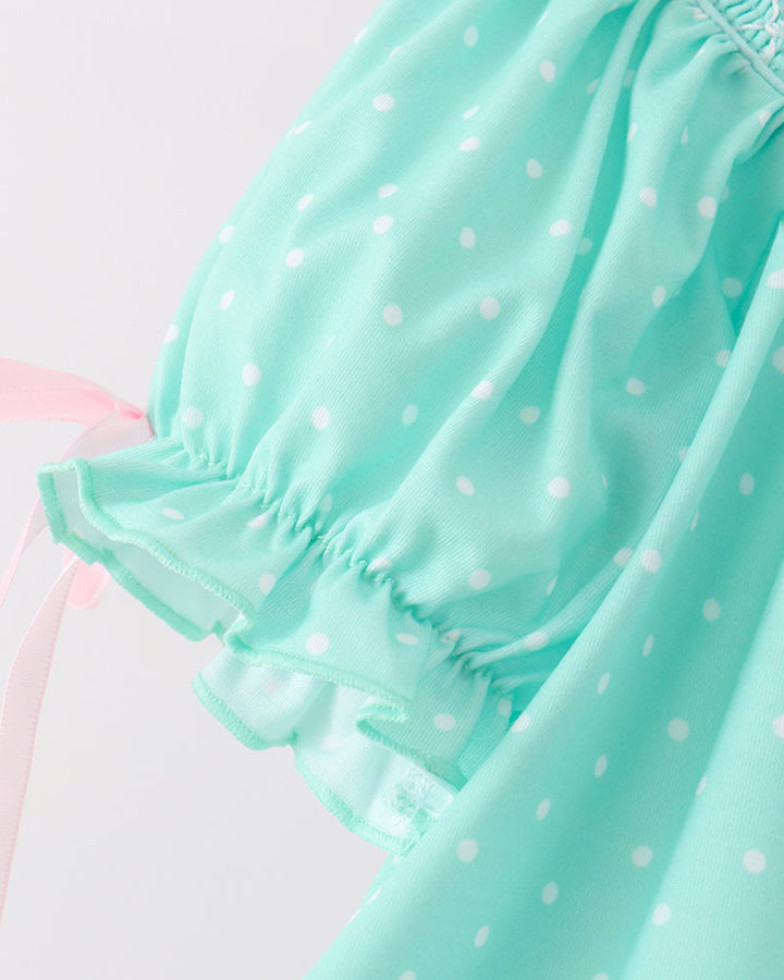 Mint polka-dot ruffle sleeve top with gathered elastic cuff and tie bows
