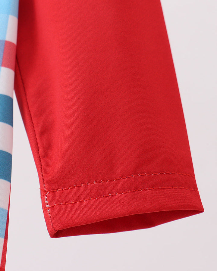 Close up of red sleeve on grey background