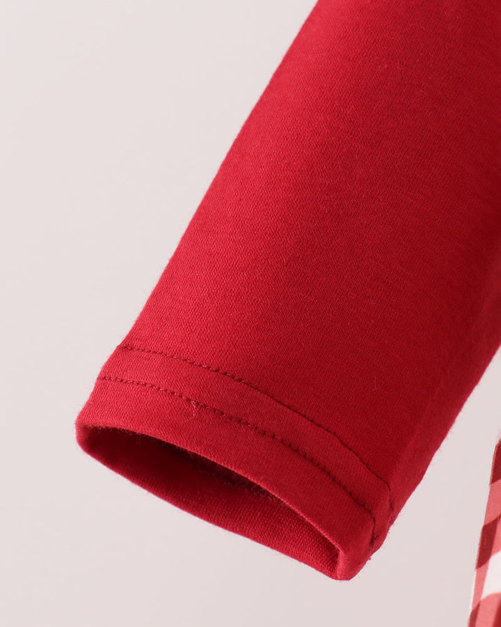 Red fabric baby bubble romper sleeve cuff with stitched hem and elastic band