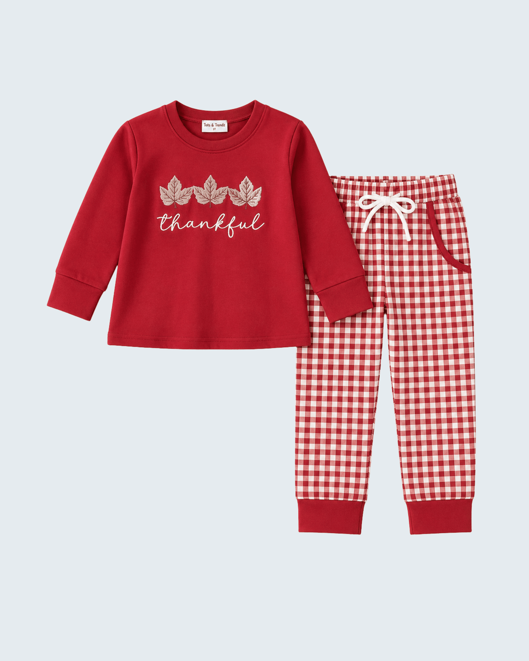 Maroon long-sleeve top with thankful embroidery and red-white gingham jogger pants