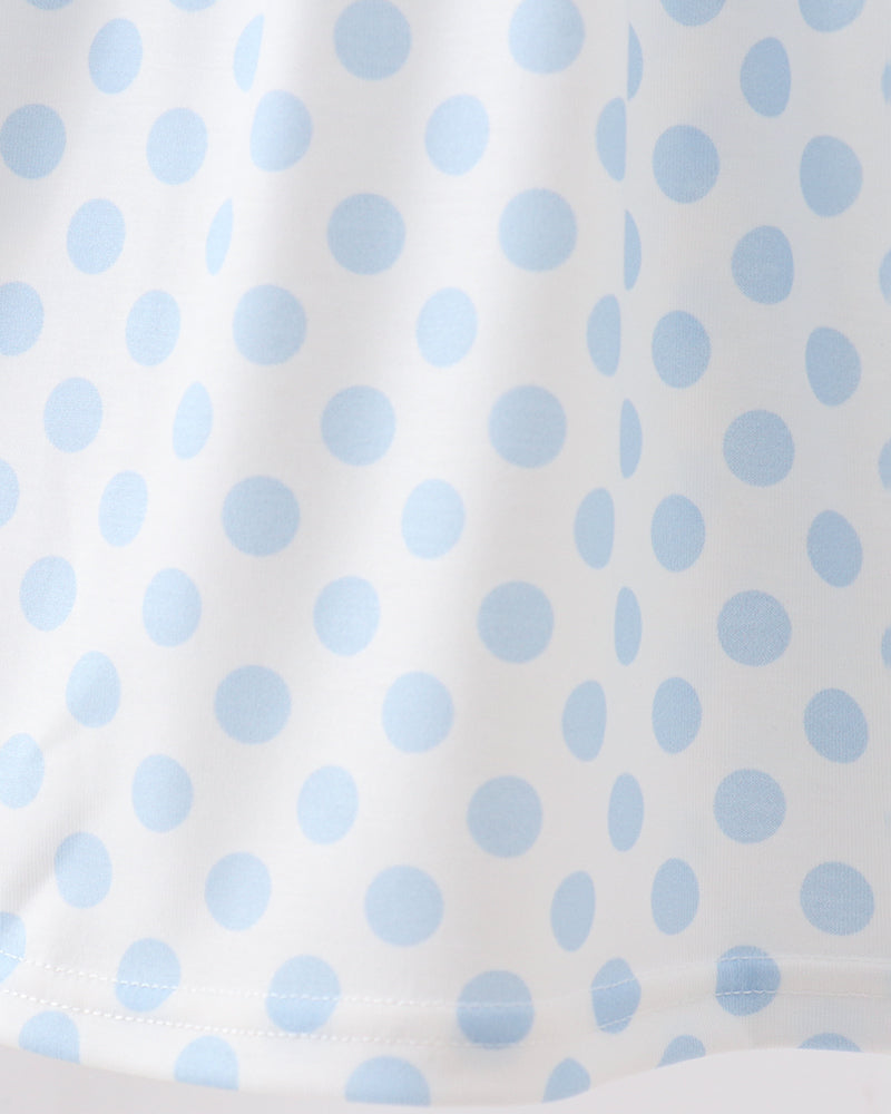 White and blue polka dot fabric