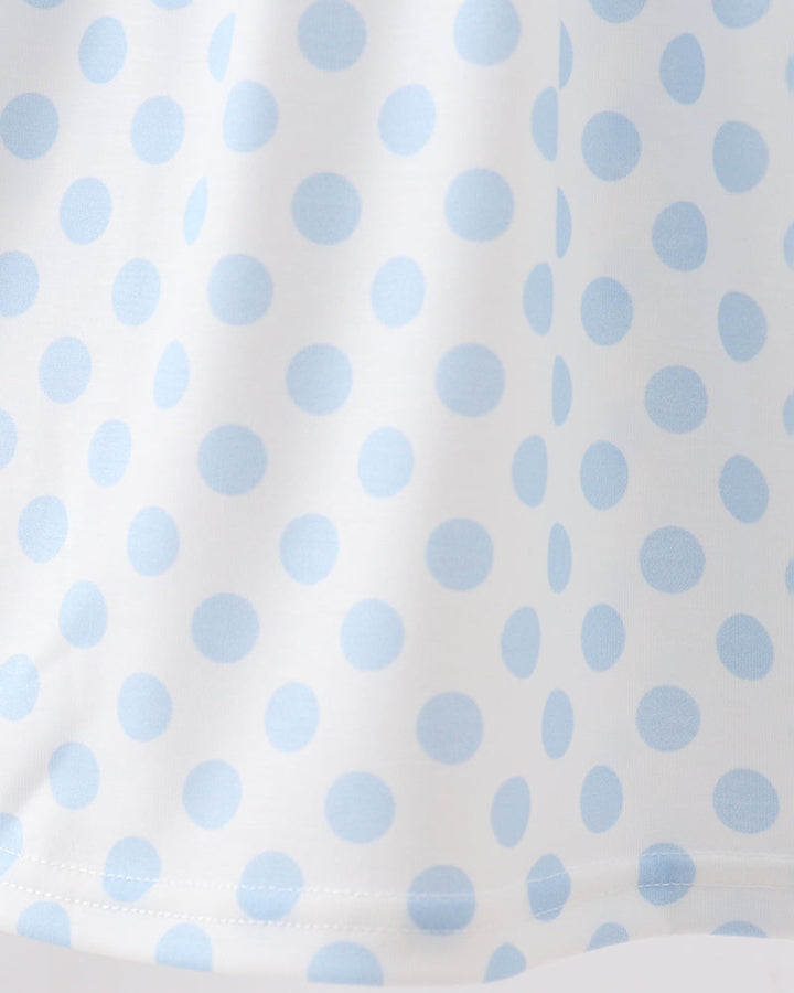 White and blue polka dot fabric