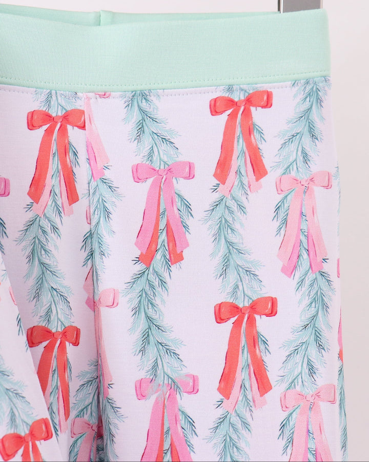 Printed pajama pants with mint waistband, light blue tree and pink bow pattern