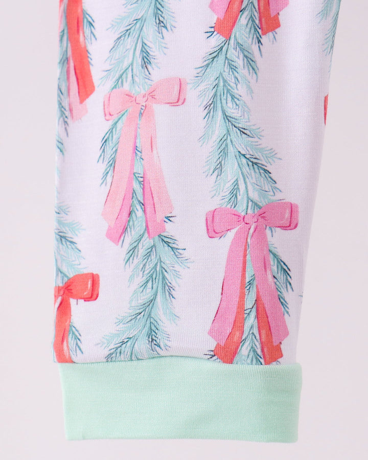 Printed pajama pants with mint hem, light blue tree and pink bow ribbon pattern