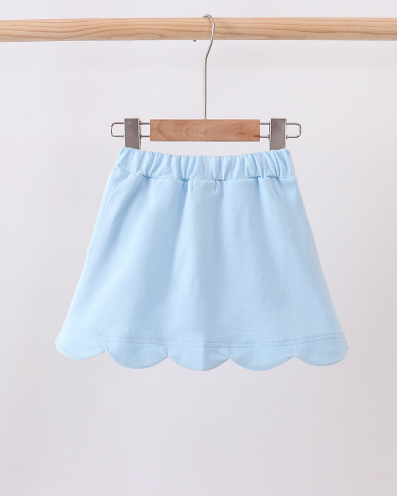 Light blue scallop-hem skort with elastic waist and bow ties