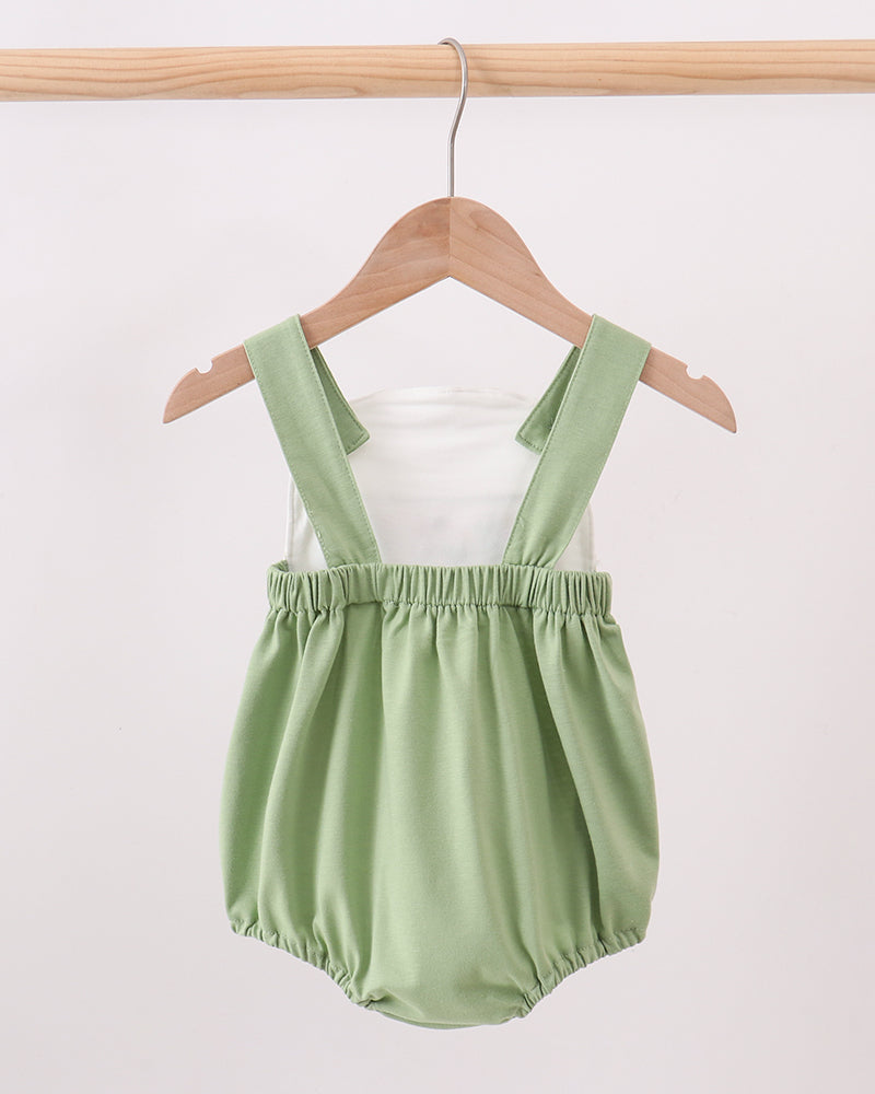 Green baby bubble romper with adjustable straps and gathered waist