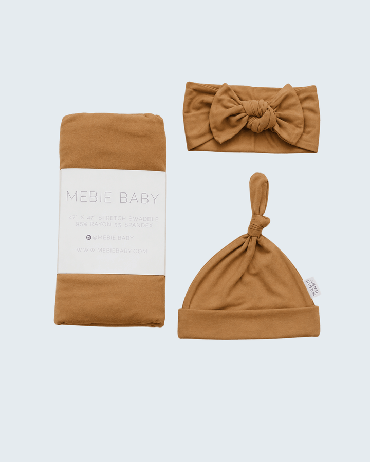 Mustard bamboo swaddle blanket with knotted baby hat and matching head wrap
