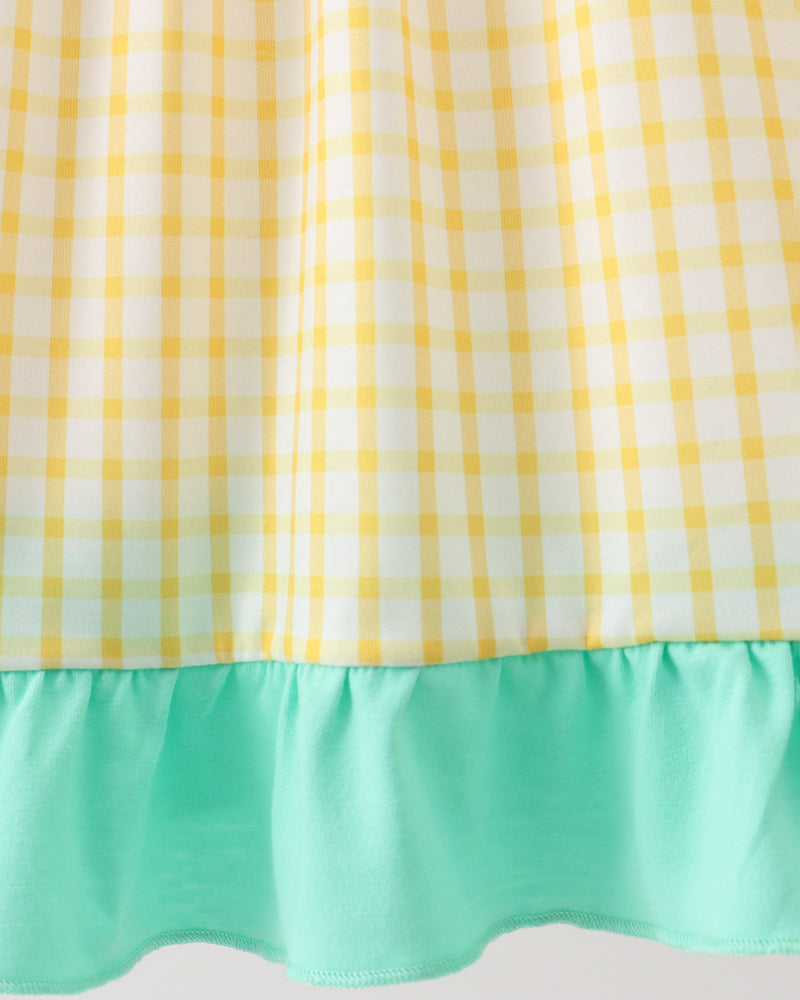 Gingham fabric with green ruffles