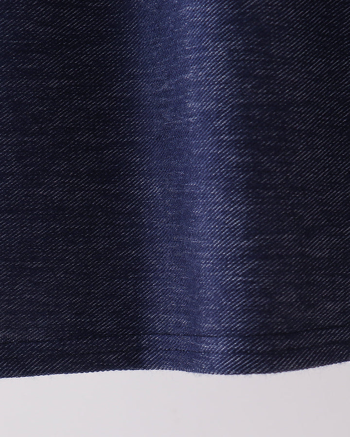 Dark navy denim skirt with gathered pleats and subtle textured fabric