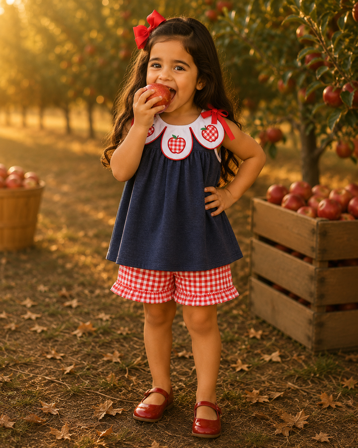 Navy denim ruffle shorts set with red apple applique and gingham trims, sleeveless