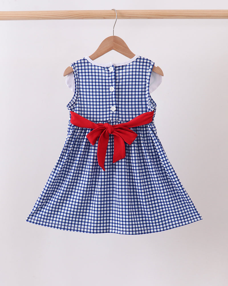 Navy Apple Embroidered Gingham Dress on wooden hanger