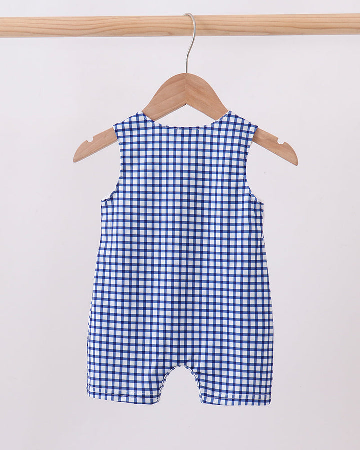 Navy Apple Embroidered Gingham Jon Jon on wooden hanger