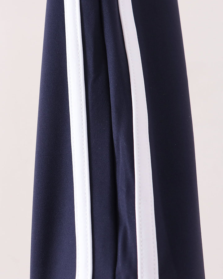 Navy active pants with vertical double white stripe along side seam
