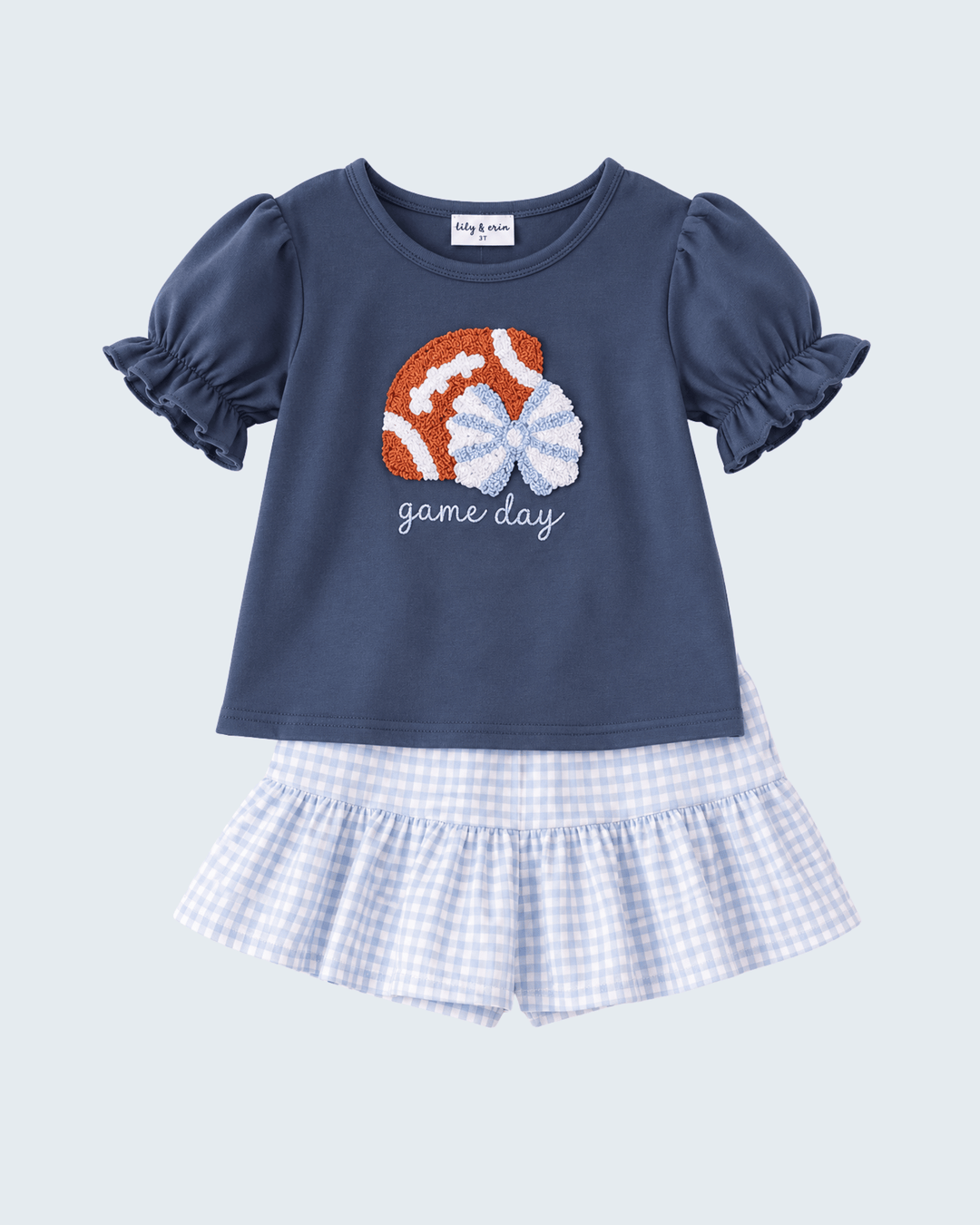 Navy skort set with football applique, 'game day' text, puff sleeves, and gingham bottoms