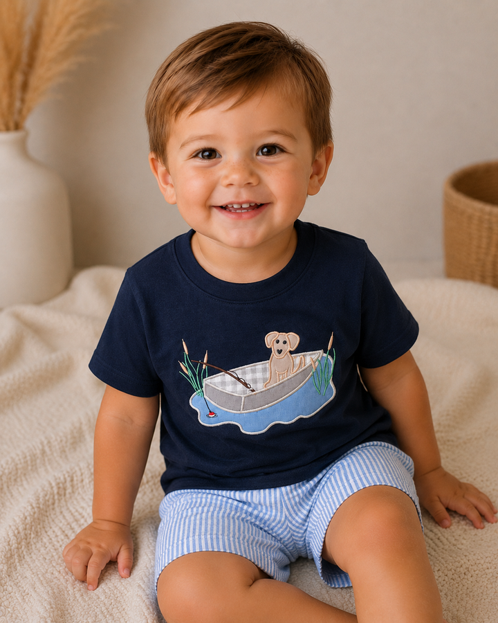 Toddler boy sitting on planket
