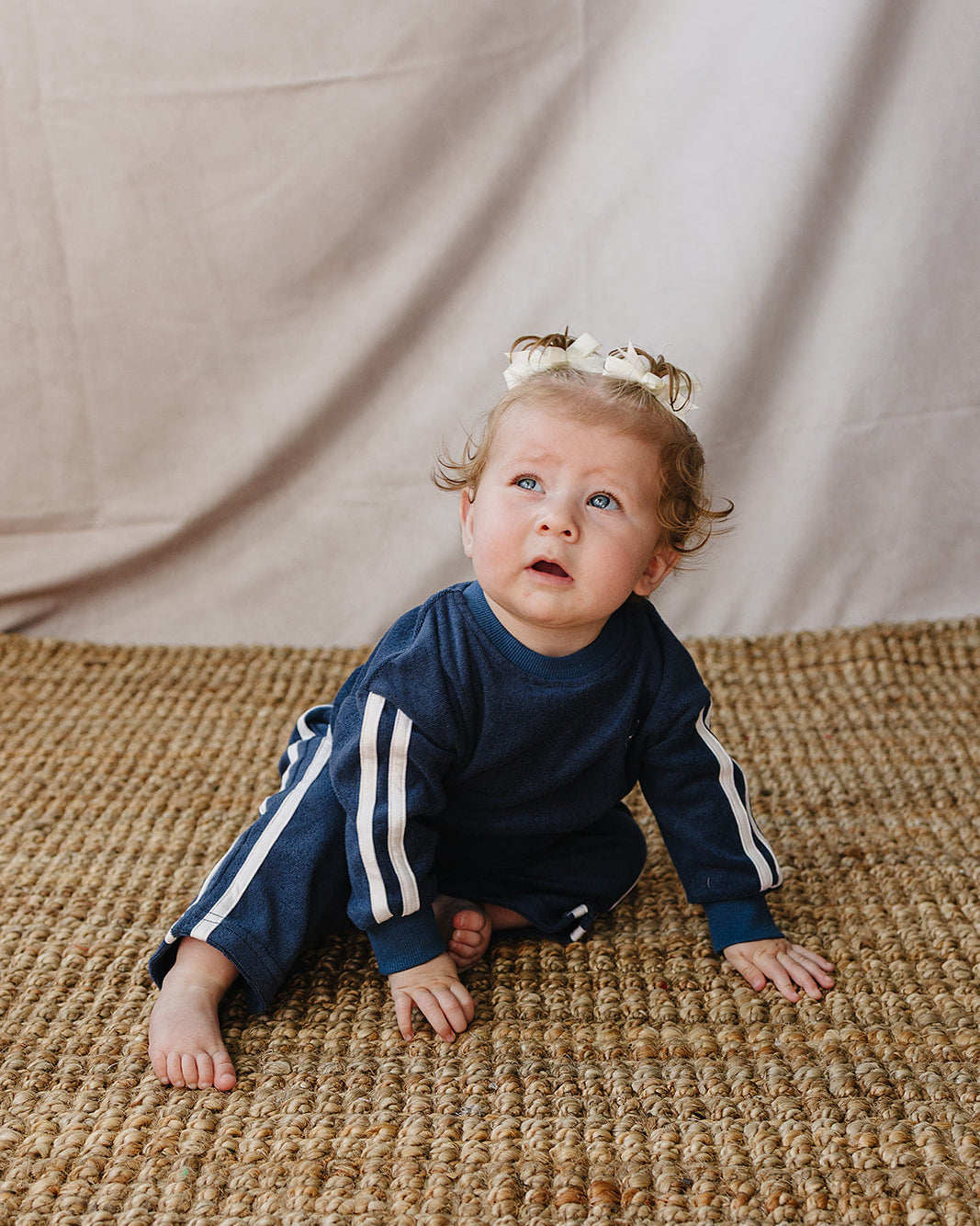Navy terry tracksuit for baby: long-sleeve sweatshirt with white sleeve stripes and pants