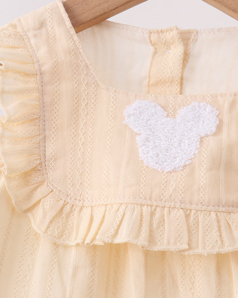 Oatmeal bloomer set with lace bodice, ruffle trim, and white character patch