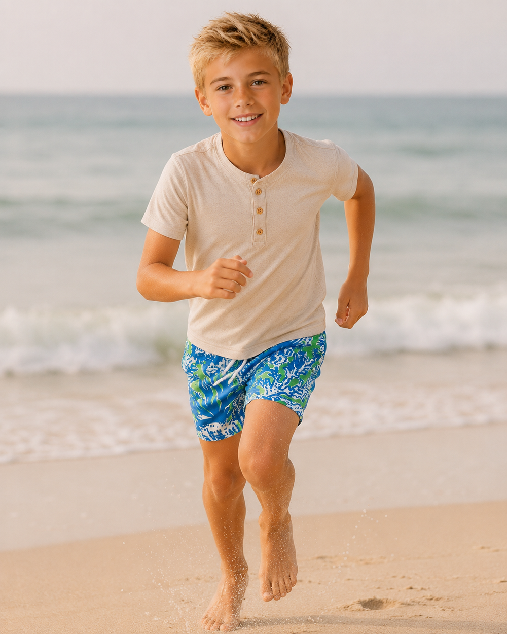 Boy running on the beach
