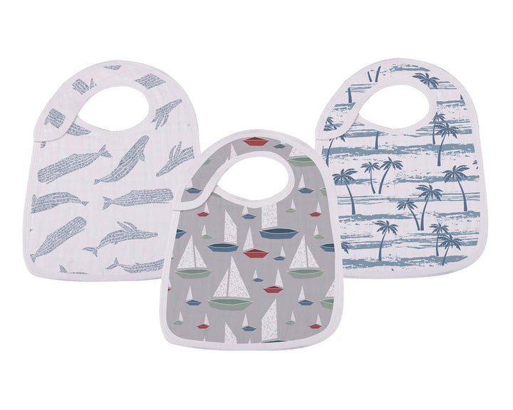 Three baby bibs with different patterns on a white background