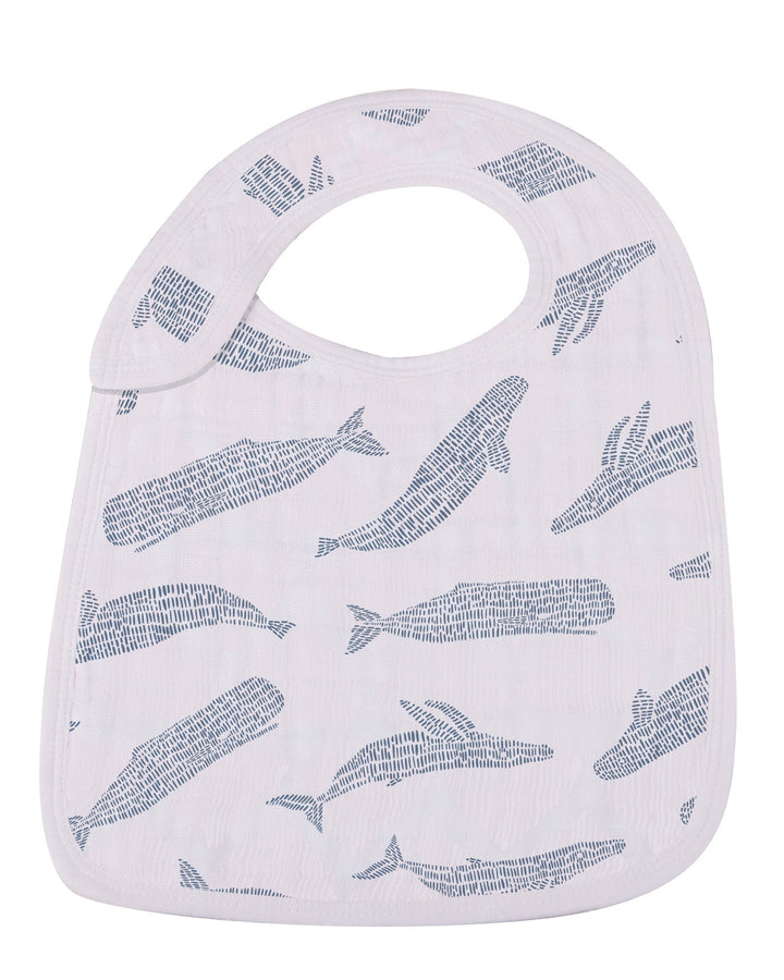 Baby bib with whale pattern on a white background
