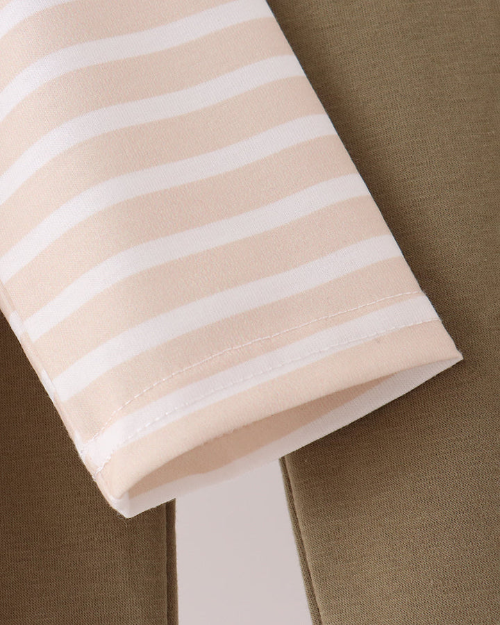 Striped long-sleeve shirt cuff and hem with neat stitching