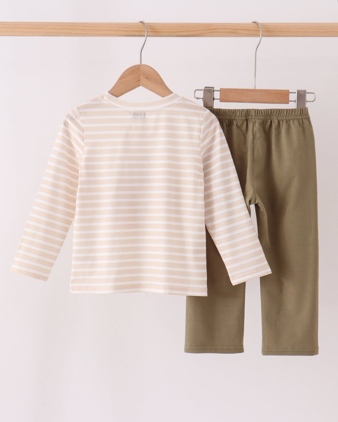 Kids striped shirt and olive pants set on hangers
