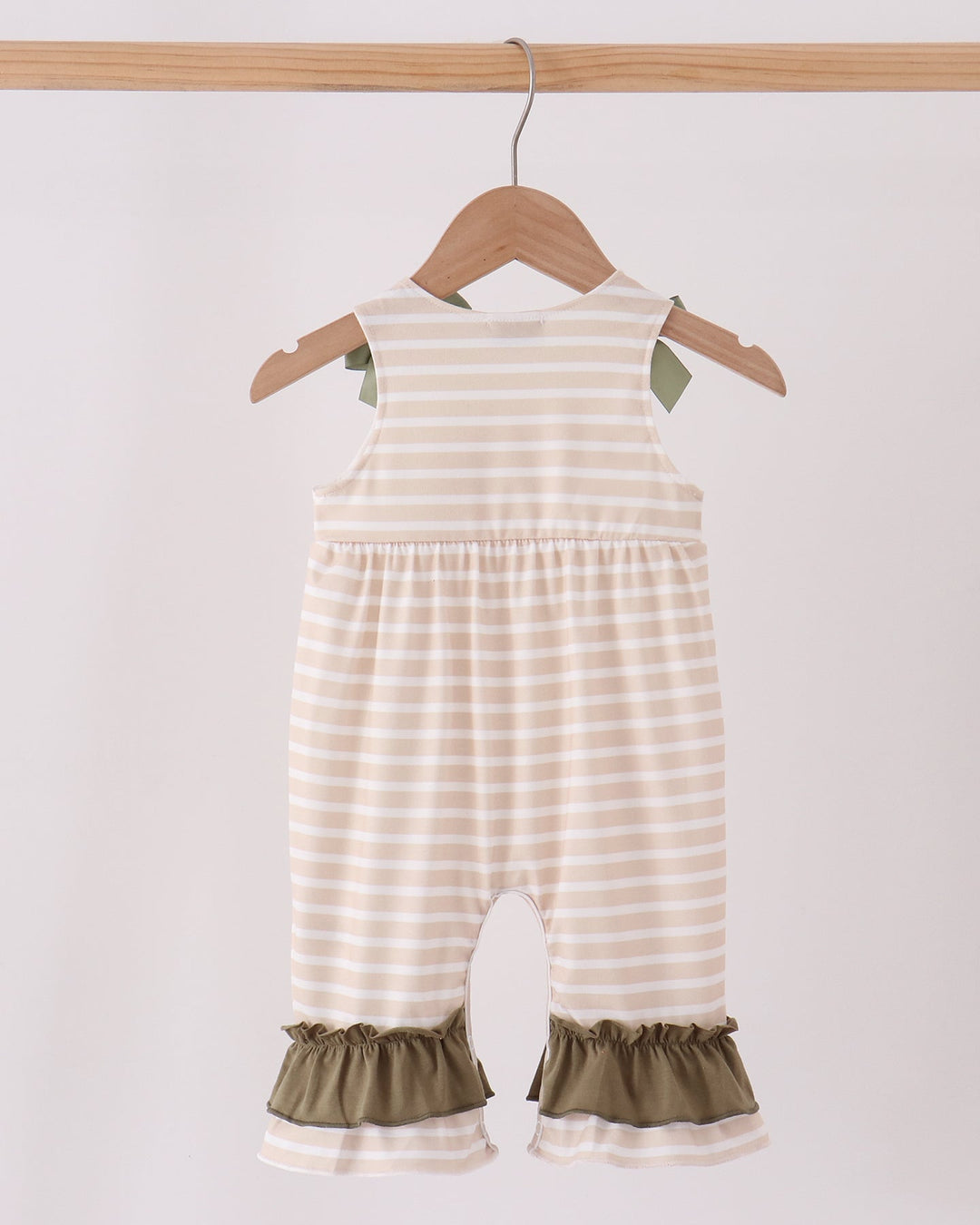 Striped romper with turkey applique center and olive ruffle cuffs, front view