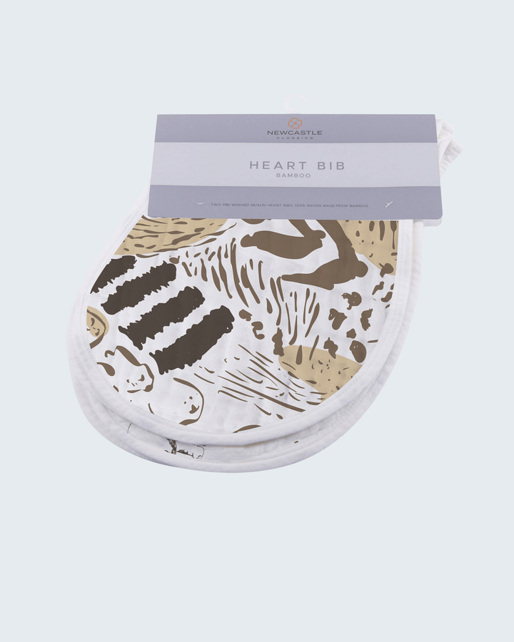 Heart-shaped bib with animal print design on a light gray background