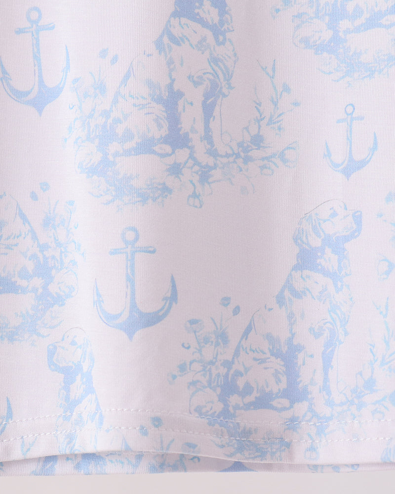 Light blue pajama fabric with all-over dog and anchor print, relaxed pant hem