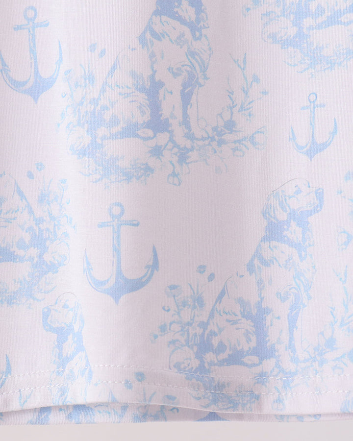 Light blue pajama fabric with all-over dog and anchor print, relaxed pant hem