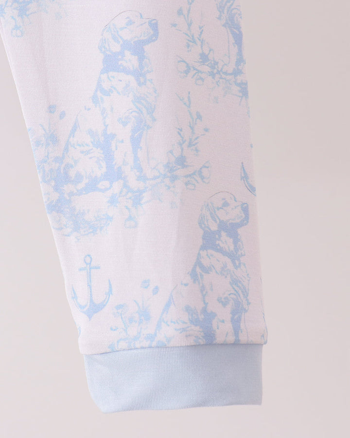 Light blue pajama pants leg with elastic cuff and dog &amp; anchor print