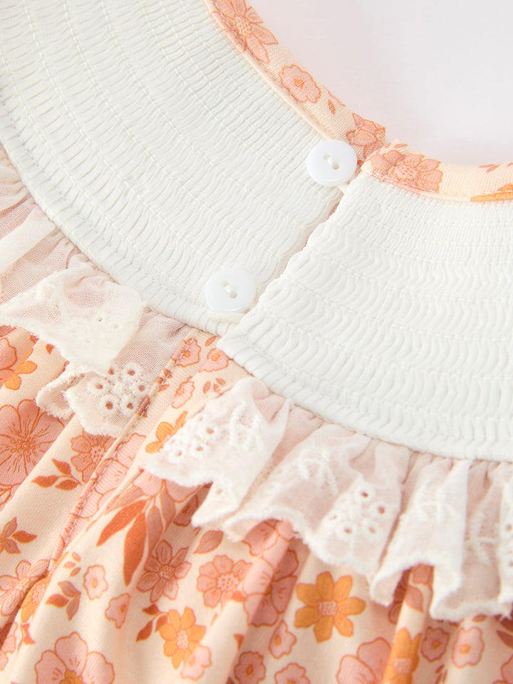 Orange floral lace dress neckline detail with white textured yoke and button placket