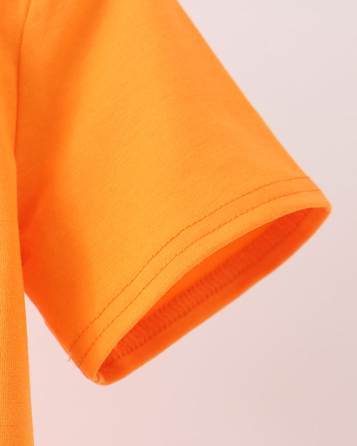 Orange short sleeve with stitched cuff and curved hem