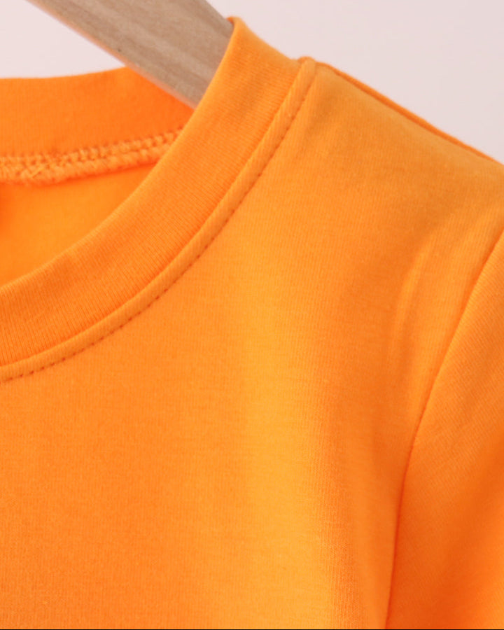 Orange crewneck T-shirt neckline with soft ribbed collar
