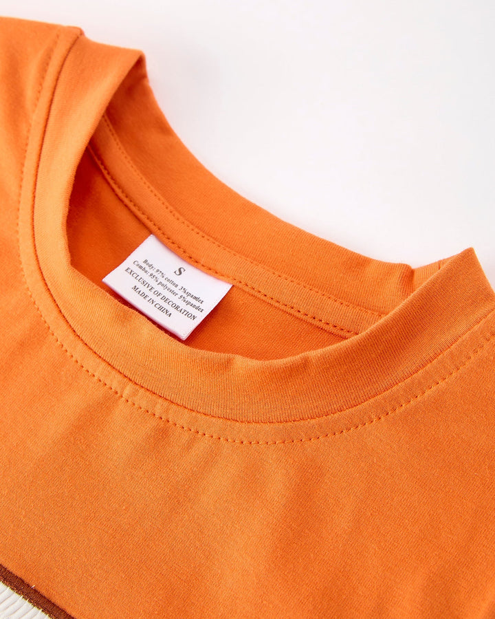 Orange kids T-shirt with crew neck and stitched hem